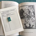 The Locket Library: Badge Robin Hood with book